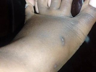 Cute plump african girl shows off her feet, black knees and light thighs for your enjoyment