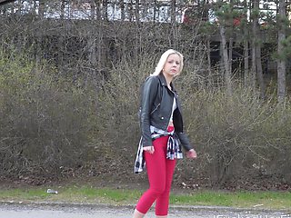 A cute blondie, Julia Parker, licks her shaved pussy with passion.