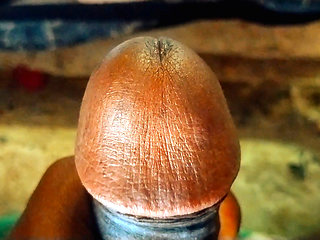 Indian boy playing with cock.