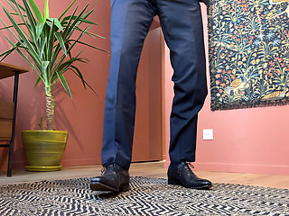 Jerking off at the office in a suit and tie