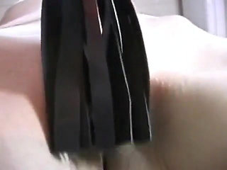 Skinny girl gets pussy pinched while she's tied down