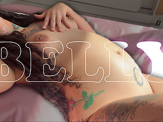 The Tattooed Girl Shows You Her Big Belly