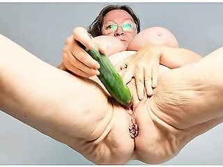 Horny Granny Masturbate By Cucumber
