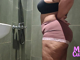 Candid Camera Peeking at a hot BBW wife while she's taking a shower.