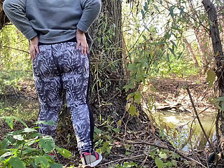 Mature, curvy milf stepmom fingers herself outdoors