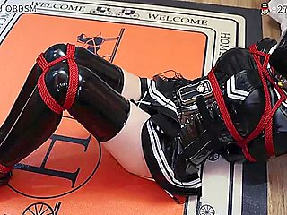 woman tied by red rope