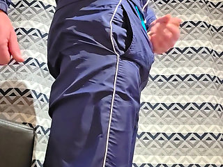 Handjob tracksuit nike in front of a porn movie