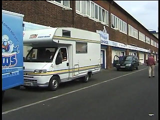 Hot girl sucks a huge cock inside the delivery van