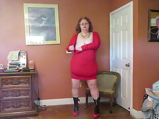 Strip tease from red dress and flaming boots part 1