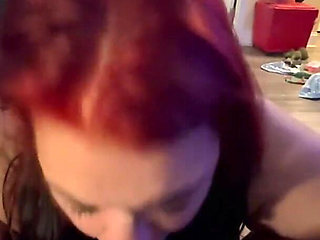 Sexy Redhead Sucking Black Cock and Balls