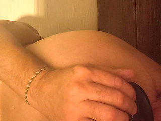 Grandpa stimulates his anus with his fingers and his special prostate dildo and it makes him wet