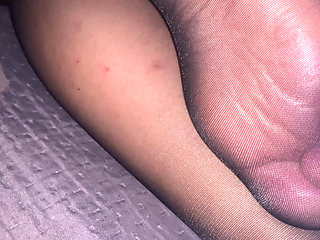 Feet in black pantyhose to jerk off and cum