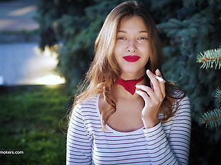 Sultry Russian Girl Smoking Cigarette by Waves