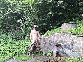 Jerking off in Public on the Road Near a Spring, Caught by a Young Man Masturbating Completely Naked