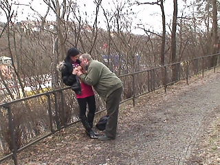 It's cold in the park and the young brunette with small natural tits gets warmed up by an old man and swallows all the cum