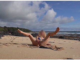 Nymph Plays Dildo On Public Beach