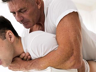 Suited DILF barebacks smooth twink