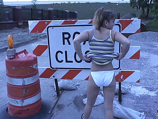 Shy waitress gets naked at a construction site