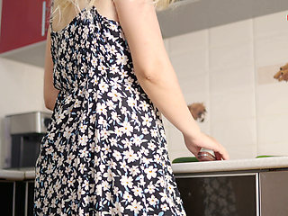 Blonde Slut in the Kitchen Fucks Herself with a Huge Cucumbe