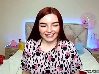 Ginger amateur babe NicolPot with big boobs strips down to bra on webcam