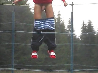 Teen Shows His Big Cock for Fun on a Trampoline at the Camp