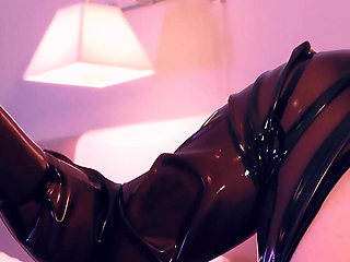 A MILF in Latex Anally Trains Her Slave, Pees on Him, Ties Him up, and Pours Wax on Him