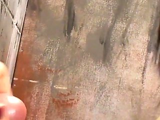 Locked in the bathroom, she can't resist the cock coming out of the wall