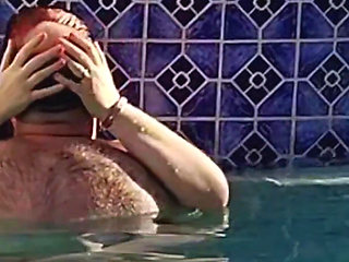 Hot Long Haired Ginger MILF Taking a Dip and Fucking in Outdoor Pool