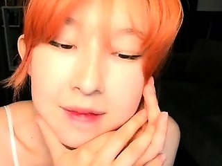 Blue eyed milf in close up striptease video