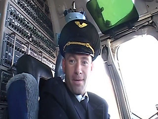 Randy pilot fondles sexy brunette in the cockpit
