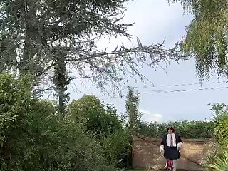 Dressed in a small black skirt and a leopard tie for an evening.