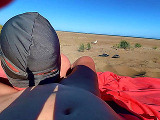 My cuckold licks on the beach