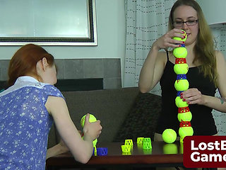 Two lesbians in an intimate Strip Ball Stacks challenge