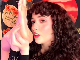 Tattooed busty brunette with foot fetish does hot footjob