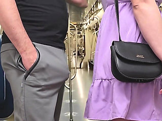 Almost Seen by Subway Passengers When She Touch Stranger's Dick Through Pants