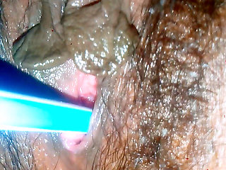 Geeta Bhabhi having sex with a pencil in a dark room