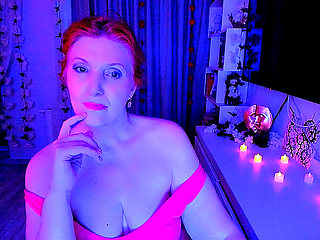 Redhead woman is moving under quite music