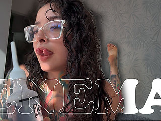 A Girl with a Split Tongue Gives Herself an Enema on Camera
