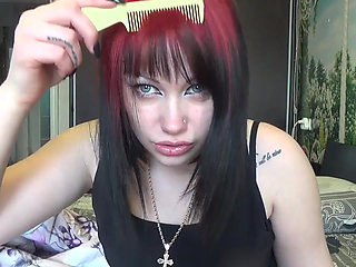 Brushing my hair with little and big brush and by long nails