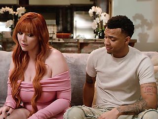 Redheaded MILF Lauren devours Lawson's thick cock in a steamy interracial encounter