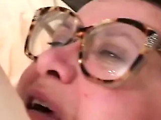 Hairy old BBW solo fuckin' her fat pussy with a big dildo in bed