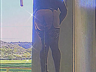 Boy in lingerie playing with his dildo in public