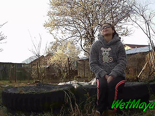 Peeing on some old tires in the yard