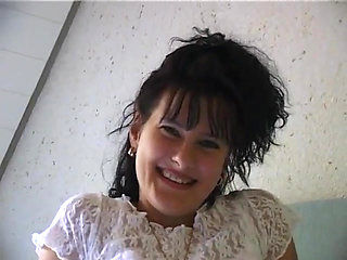 Horny girl lays in bed finger fucking herself and stroking clit