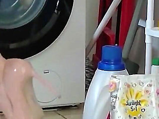 Laundry in Highheels Doing Laundry in Denim Shorts and Pointy Stilettos
