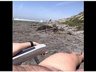 At The Nude Beach. Putting On A Sunscreen Cream Teasing