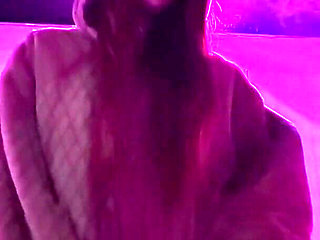 Smoking a Cigarette Outdoor While Wearing Only a Bikini and a Jacket