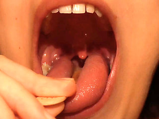 I Eat the Popsicle and Suck on It. After I Eat the Popsicle, I Examine My Mouth and Throat with the Popsicle Stick
