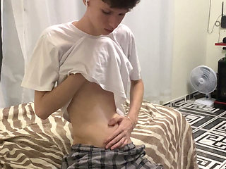 Skinny blonde twink showing his naked body