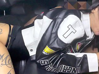 Tattooed woman gets fucked hard in the backseat after the party